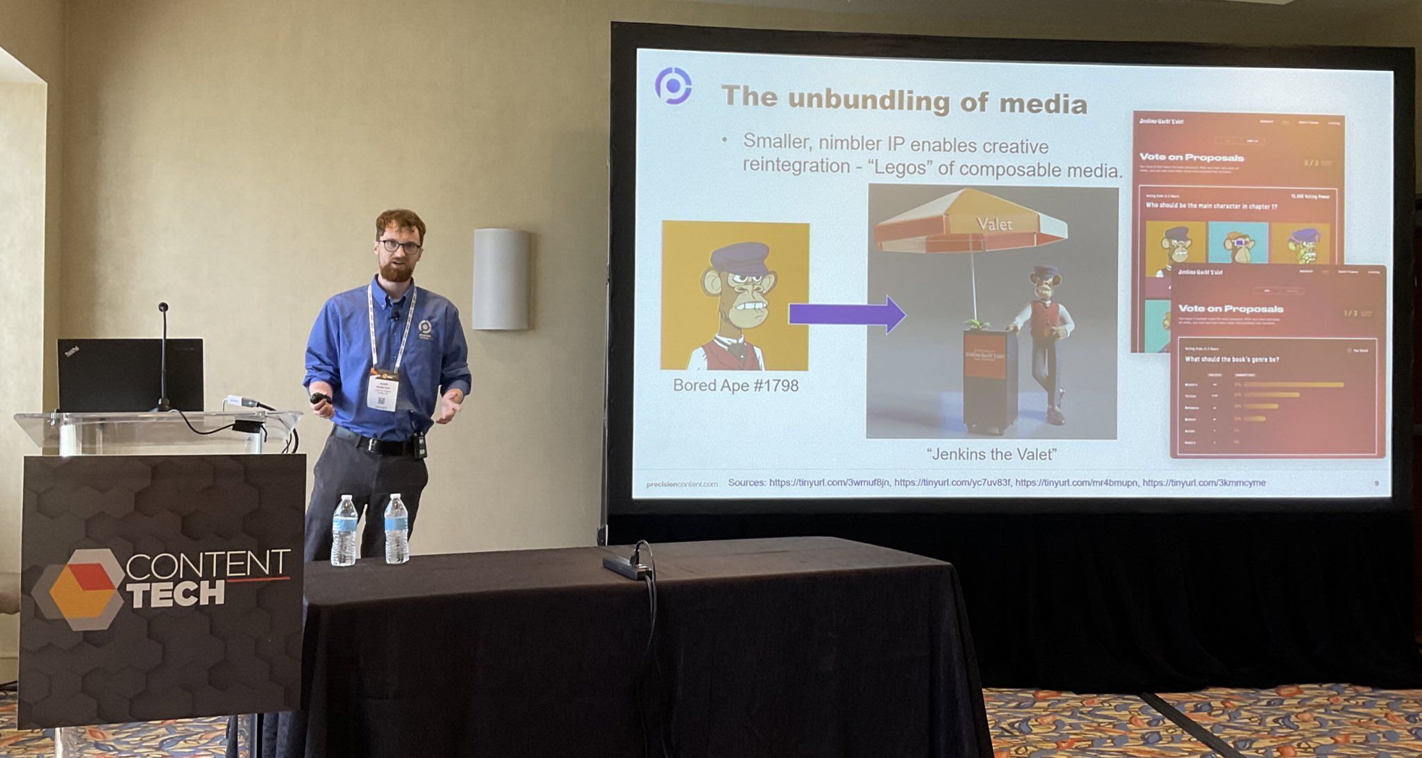 Josh Anderson standing in front of slide deck and presenting at ContentTECH Summit 2022